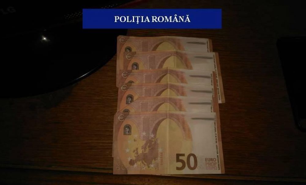 Reţinuţi de poliţişti pentru că falsificau bancnote de 50 de euro